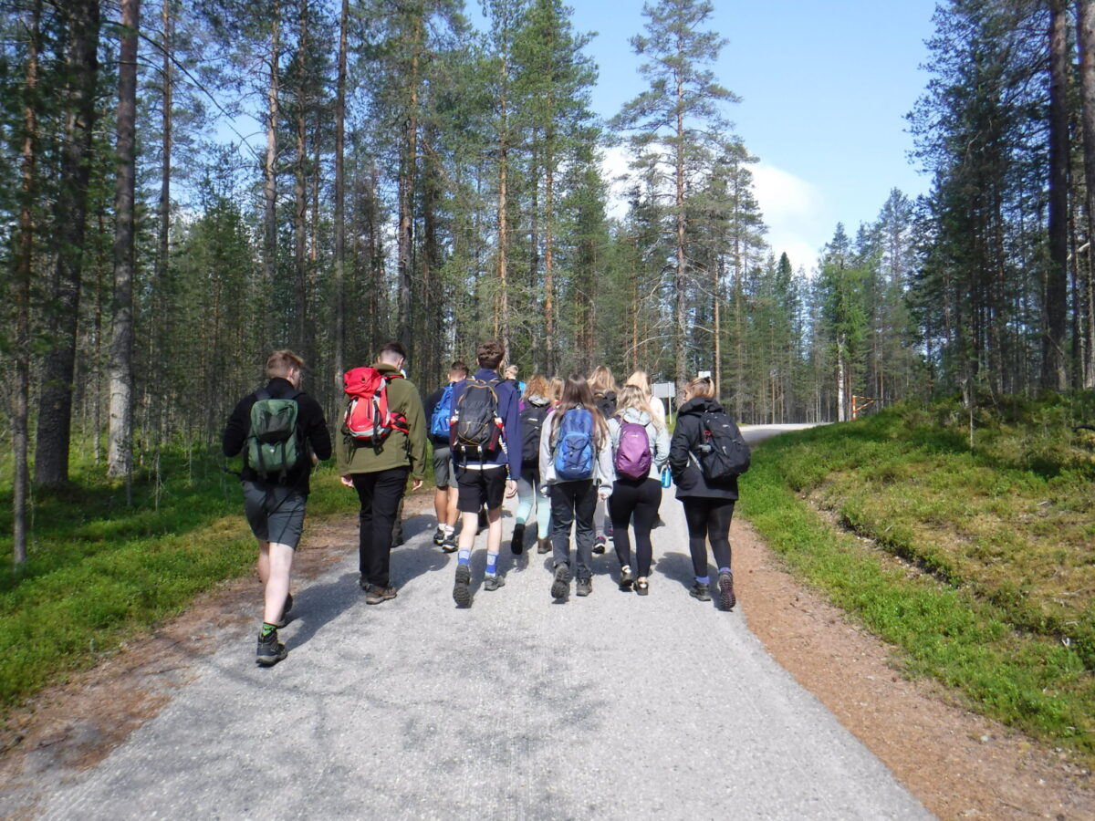 Team trekking in Hossa Finland Summer